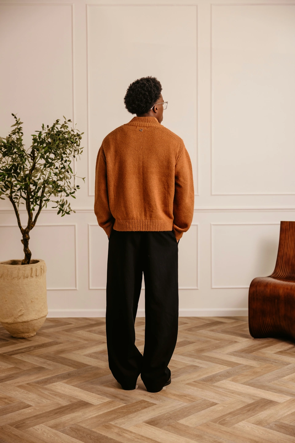 Camel wool-blend zip-up cardigan — male model, full-length back view