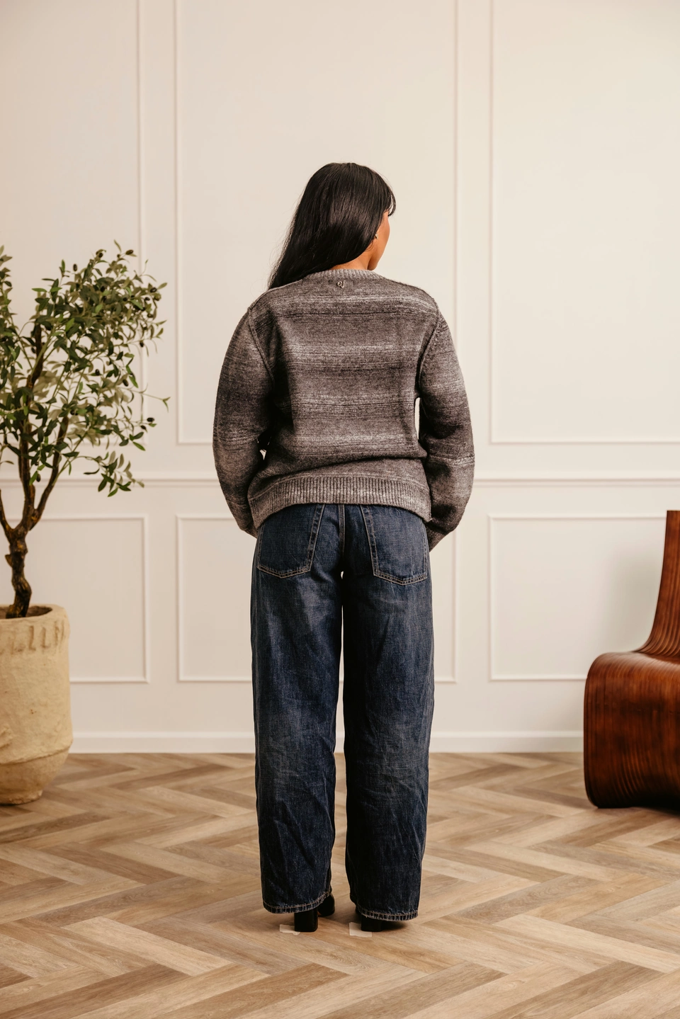 Charcoal Mist alpaca wool gradient knit sweater — female model, full-length back view