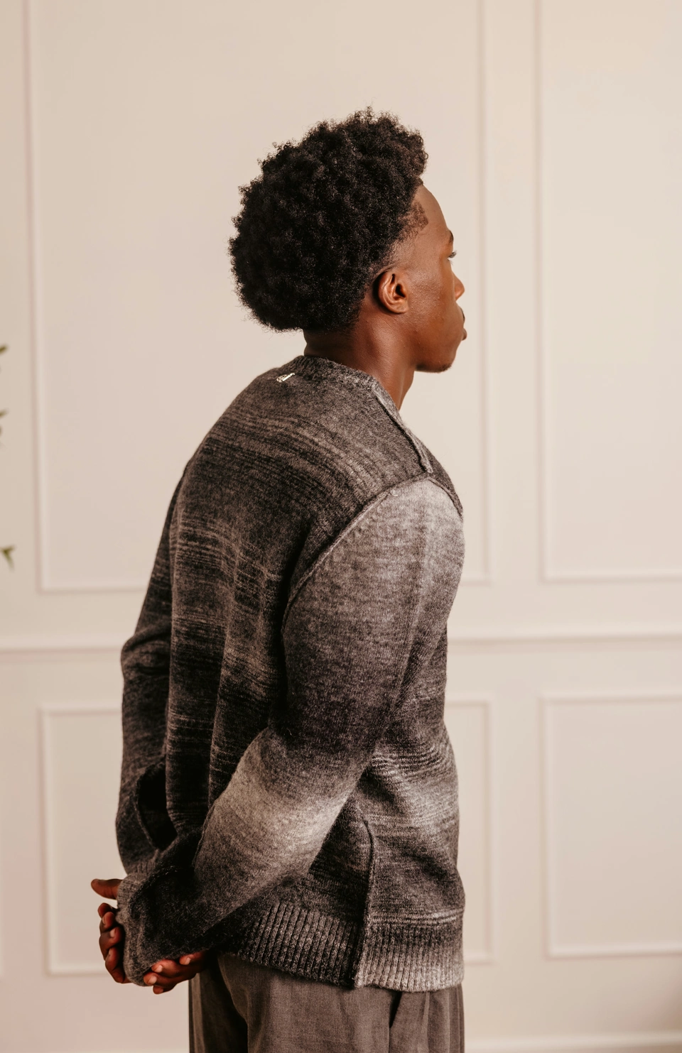 Charcoal Mist alpaca wool gradient knit sweater — male model, upper-body side view