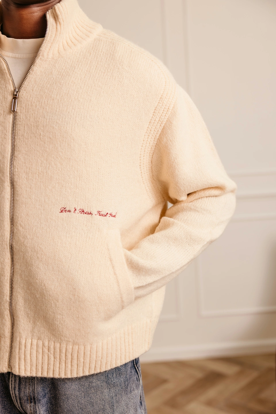Ivory wool-blend zip-up cardigan — embroidered slogan and pocket detail