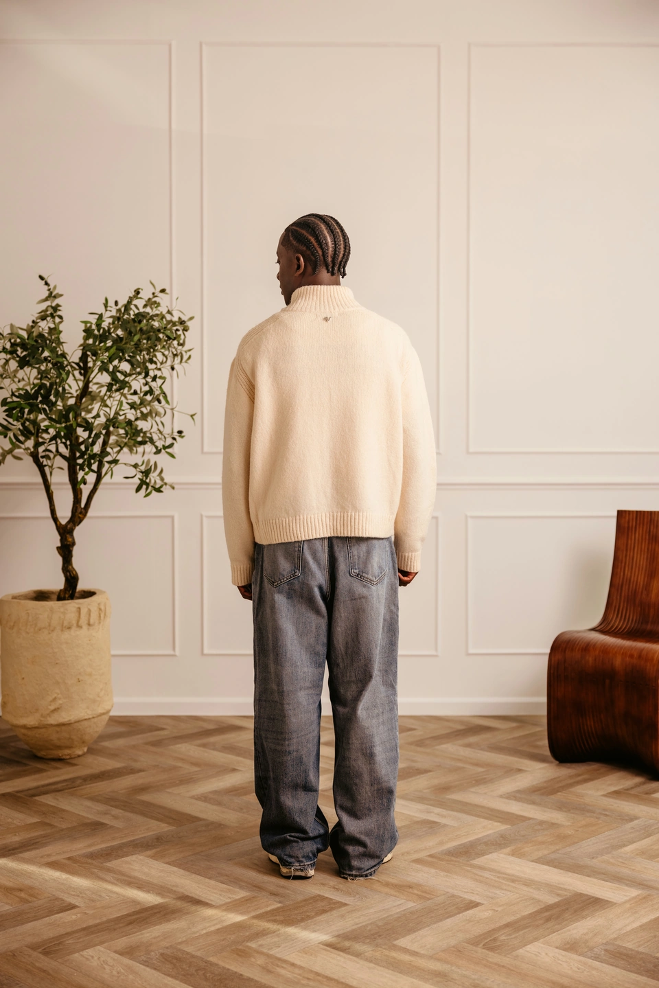 Ivory wool-blend zip-up cardigan — male model, full-length back view