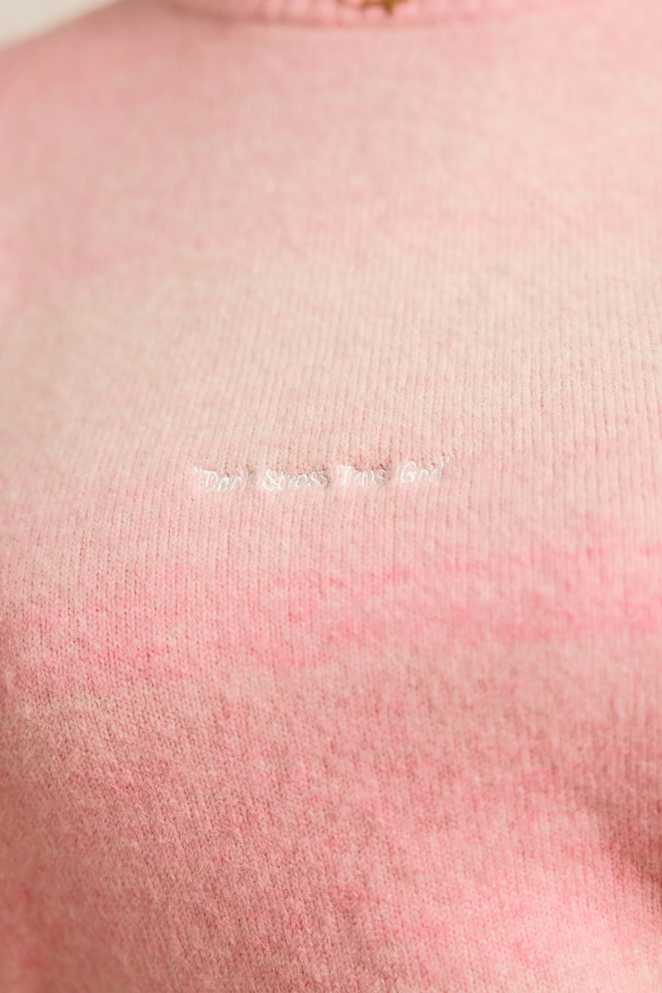 Soft Dawn Pink alpaca wool gradient knit sweater — embroidered chest slogan and pink gradient detail