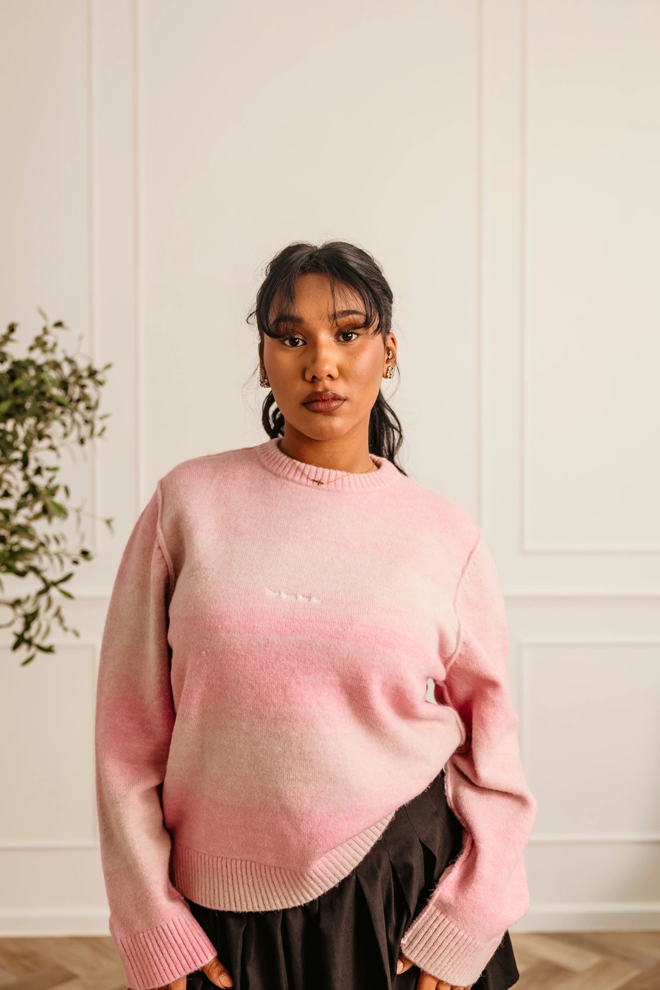 Soft Dawn Pink alpaca wool gradient knit sweater — female model, upper-body front view